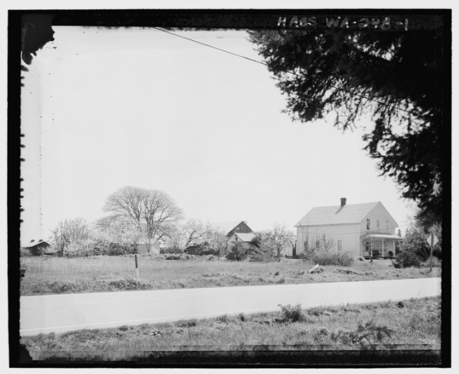KINETH_FARM_FROM_ACROSS_HIGHWAY_20,_LOOKING_SOUTHEAST._The_Kineth_house_is_seen_on_the_right,_facing_the_highway._Behind_the_house_the_milk_house,_out_house,_and_a_chicken_coop_are_shown
